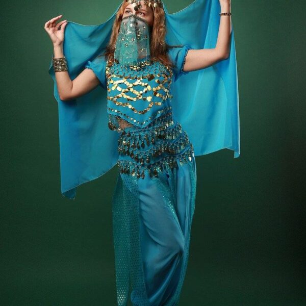Belly dance instructor leading a vibrant class with participants in colorful attire.