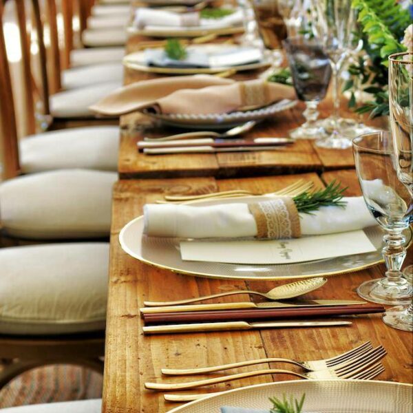 Table setting with fine dining utensils used in a dining etiquette training session.